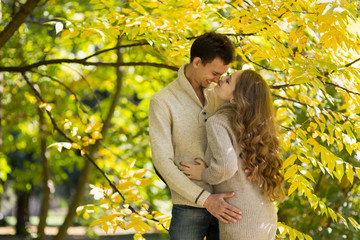 beautiful couple in autumn park