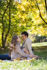 Young couple in autumn park