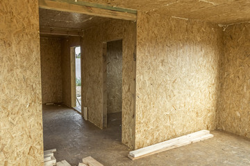 Construction of a wooden house of SIP panels.