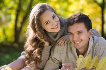 Young couple in autumn park