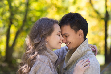 Young couple in autumn park