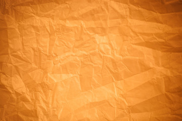 Brown crumpled paper background.