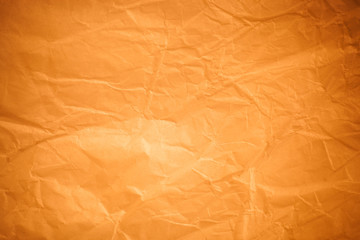 Brown crumpled paper background.