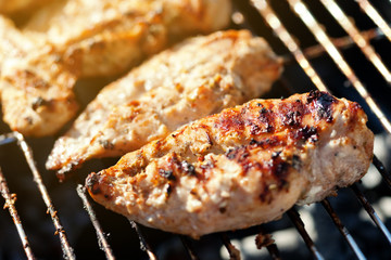 Grilled chicken breast on barbeque