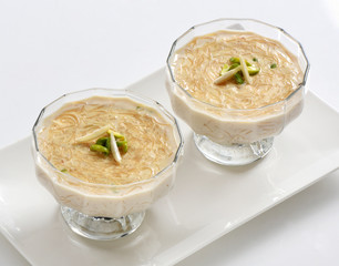 Vermicelli / Sawaiyan, A thin golden spaghetti type pasta sweet dish serve with condense milk and in sugar syrup.