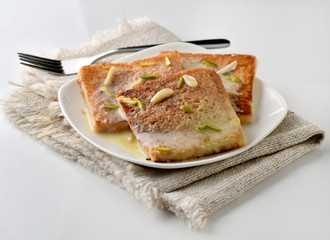 Shahi tukrey, A delicious and yummy bread pudding dipped in condensed cold milk for a mouth melting taste