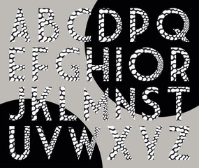 decorated alphabet with stylized reptile skin pattern in silver shades