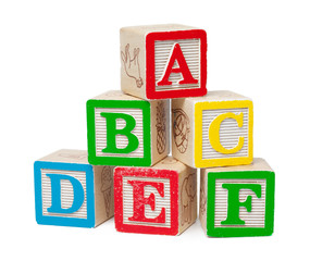 Wooden alphabet blocks isolated on white background