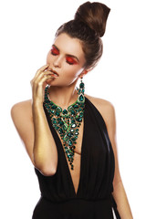 Sexy woman wearing big beautiful necklace with a lot of gems © blackday