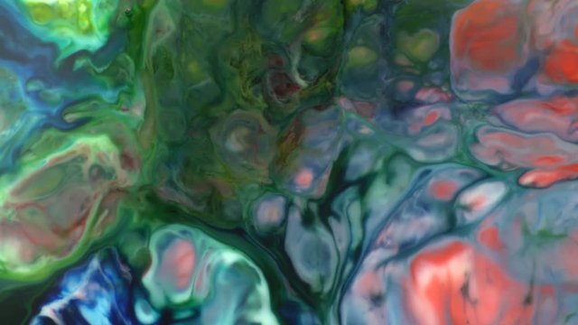 Red Blue Green Yellow Stream abstract food color ink moving or flowing background. Colorful food color ink dissolving artistic concept background. 4k 3840x2160 high resolution footage for design