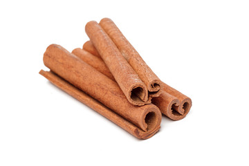 Cinnamon sticks isolated on white background