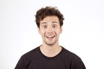 Fototapeta premium Young boy in T-shirt grimacing