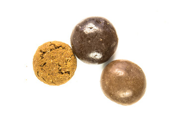 Pepernoten bunch of traditional and chocolate  treats on white background