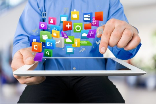 Young business person working with digital tablet