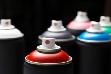 Spray paint cans close up