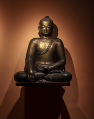 Statue of Gautam Buddha meditating, placed at Patan Museum in Nepal
