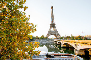 View on the Eiffel tower on Seine river during the sunrise in Paris
