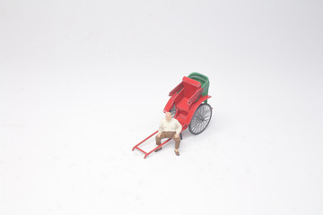 a Mini of vintage oriental rickshaw cab