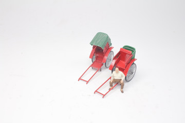 a Mini of vintage oriental rickshaw cab