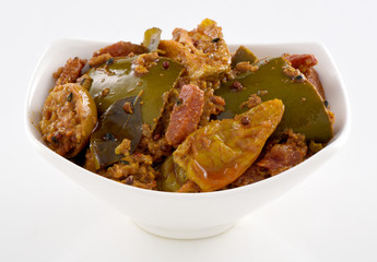 Mix Achar, A pure Desi traditional dish of mix vegetables stuffed with spices & dipped in thick oil and necessary for every dastarkhan.  