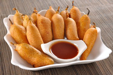 Chilli Pakora / Green Chilli Fritter, A spicy light snack serve with raita & chutney. 
