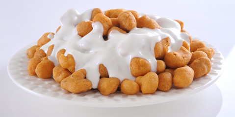 Dahi Bhallay, A yogurt base deleciuos street snack available with plain spicy, mix chat, papri, meethe & chana chaat 