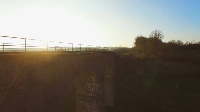 Aerial 4k of the Disused Fleet Viaduct with arches in the Highlands of Europe