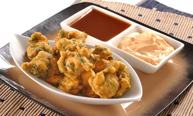 Pakora, a full nutrition spicy food with stuffed onion, chilli &  gram flour