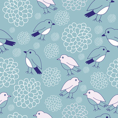 Vector Blue Birds and Blossoms Seamless Pattern Background. Perfect for wallpaper, fabric and scrapbooking projects.