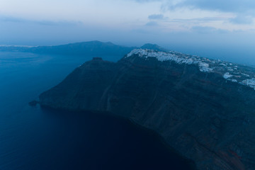 Aerial view of famous Greek resort Thira before sunrise.