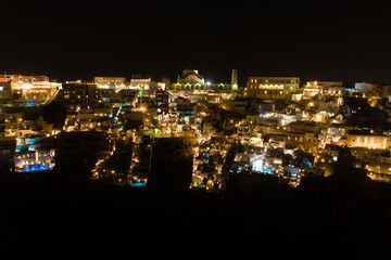 Aerial view of famous Greek resort Thira at night.
