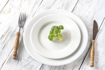 Fresh broccoli on the white plate