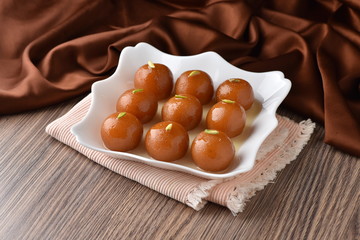 Gulab Jaman, Delicious milk solid balls soaked in sugar syrup