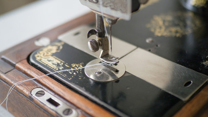 Foot of antique manual Sewing Machine, close up