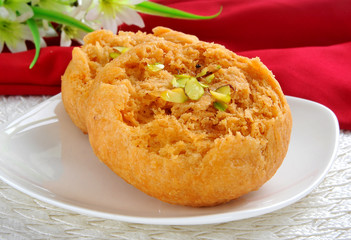Makhan Bara or Buttery Puff is a famous and delicious sweet food in South Asian Countries