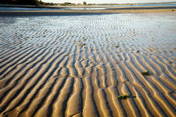 Undulations in sand on Studland beach at low tide, Dorset