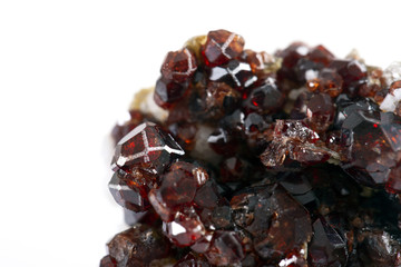 Uncut and rough deep red rhodolite garnet gemstone.