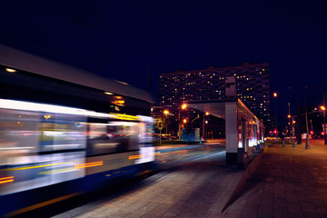 Fototapeta na wymiar public transport metropolis, traffic and blurry lights train at night.