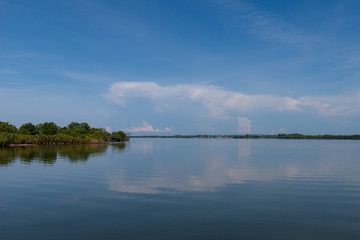 clouds blue sky above ocean and sea waves