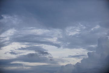 Naklejka na ściany i meble Rain clouds forming with blue sky background