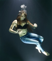 Fototapeta na wymiar underwater fashion shoot