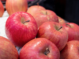 Red apples with packing foam net in super market