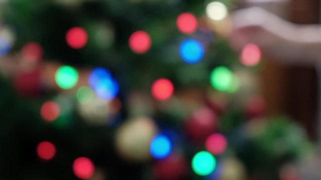 Christmas background with colorful glowing lights.