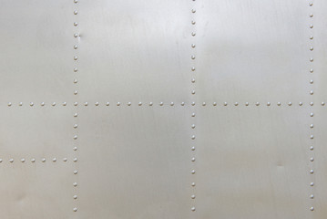 metal aluminum surface of the aircraft fuselage texture - 228093113