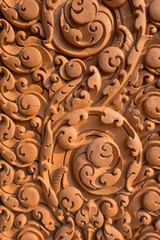 Art carved abstract background made of clay pigment