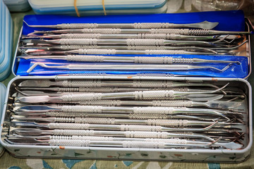 set of new metal dentist tools, selective focus