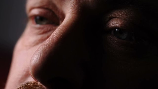 Depressed sad mature man's eyes. Loneliness,depression, sadness