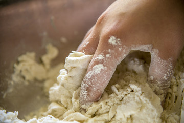 Kneading dough with fingers