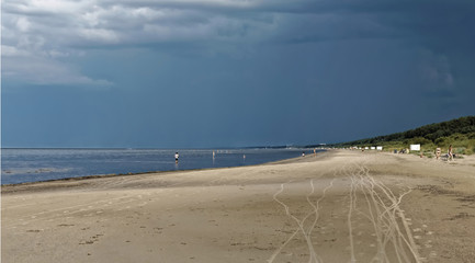 Fototapeta na wymiar On the beach after the rain