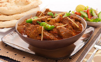 Chicken Kerhai, Delicious Chicken cooked in traditional wok pan with lot of chillies and spices.